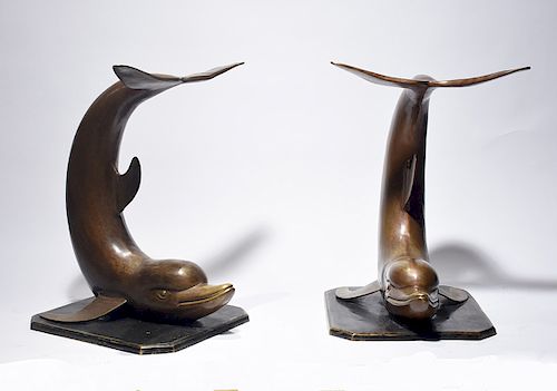 Pair of large size bronze dolphins, 20th C. 