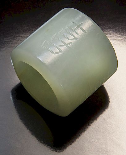 Chinese Qing carved jade archer's ring,
