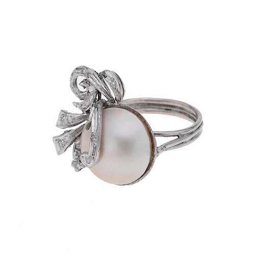 Anillo vintage con media perla diamantes en plata paladio. 1 media perla cultivada de 15 mm color blanco. 12 ascentos de diamant...