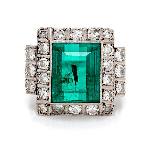 A Platinum Topped White Gold, Emerald and Diamond Ring, 5.90 dwts.
