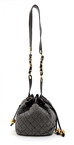 * A Chanel Black and White Houndstooth Wool and Black Leather Trim Bucket Bag, 8 1/2 x 7 1/2 x 5 1/2 inches.