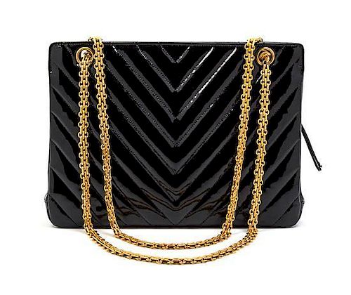 * A Chanel Black Patent Leather Chevron Quilted Bag, 11 x 8 x 3 inches.