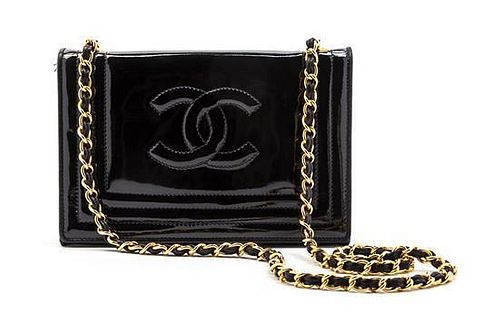 * A Chanel Black Patent Leather Flap Bag, 7 1/2 x 5 x 2 inches.