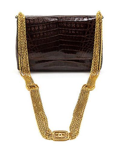 * A Chanel Brown Exotic Skin Leather Bag, 8 x 5 x 3 inches.