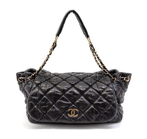 A Chanel Black Quilted Leather Bag, 12 1/2 x 8 x 6 inches.