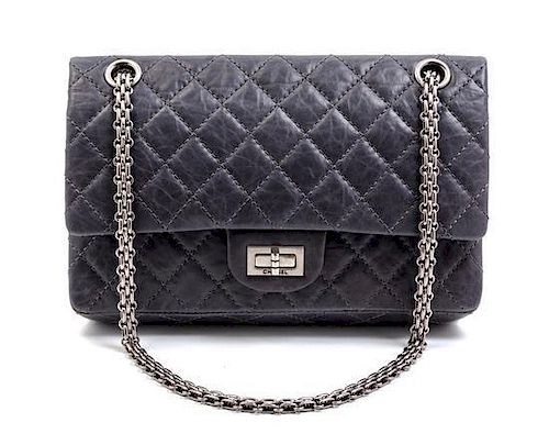 * A Chanel Grey Quilted Leather Double Flap Bag, 9 x 6 x 2 inches.