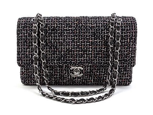 * A Chanel Multicolor Tweed Double Flap Bag, 10 x 6 x 3 1/2 inches.