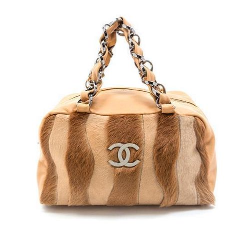 A Chanel Camel Leather and Pony Hair Bag, 12 1/2 x 7 x 6 inches.