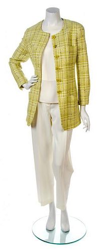 * A Chanel Ivory and Lime Wool Boucle Jacket,
