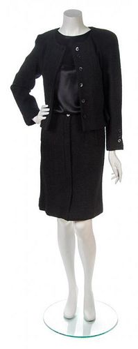 * A Chanel Black Wool Tweed Skirt Suit,