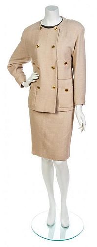 * A Chanel Eggshell Boucle Wool Skirt Suit,