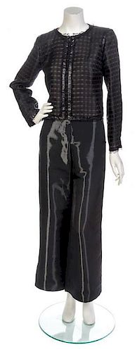 * A Chanel Black Silk Pant Suit, Jacket size 42, pants size 42.