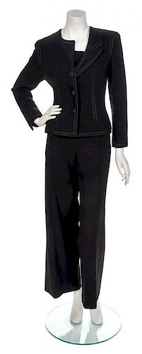 * A Chanel Black Wool and Angora Tweed Half-Collar Jacket, Jacket size 42, pants size 42.
