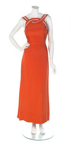 * An Estevez Orange Gown,