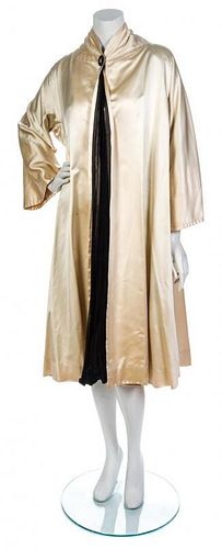 A Jacques Fath Oyster Silk Satin Opera Coat,