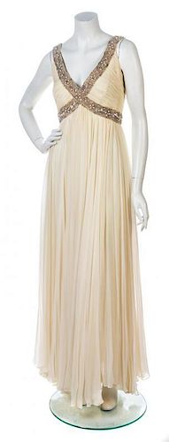 A Victoria Royale Ivory Chiffon Gown and Coat,