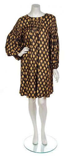 * An Yves Saint Laurent Gold and Grey Printed Tunic Dress,