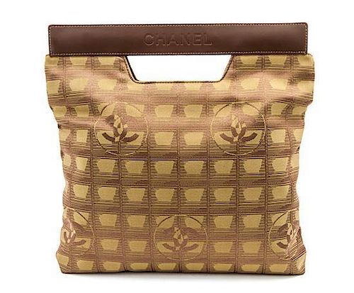 * A Chanel Khaki Canvas Travel Line Bag, 11 x 11 x 1 inches.
