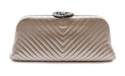 * Chanel Light Taupe Chevron Quilted Satin Clutch, 10 x 4 x 1 1/2 inches.