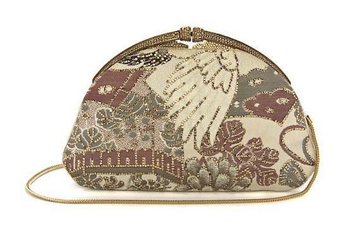 A Judith Leiber Champagne Embroidered Clutch, 9 1/2 x 6 x 1 inches.