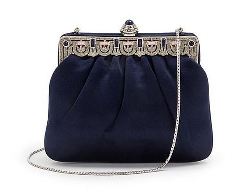 A Judith Leiber Navy Blue Satin Bag, 7 x 5 1/2 x 1 1/2 inches.