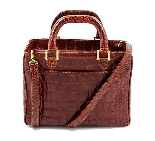 * A Lana Marks Cognac Alligator Box Bag, 9 1/2 x 6 1/2 x 4 1/2 inches.