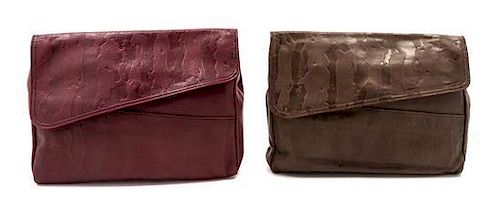 * Two Prada Embossed Leather Oversized Clutches, 13 x 9 x 2 inches.
