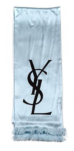An Yves Saint Laurent Blue Silk Monogram Oblong Scarf. 107 x 10 inches.