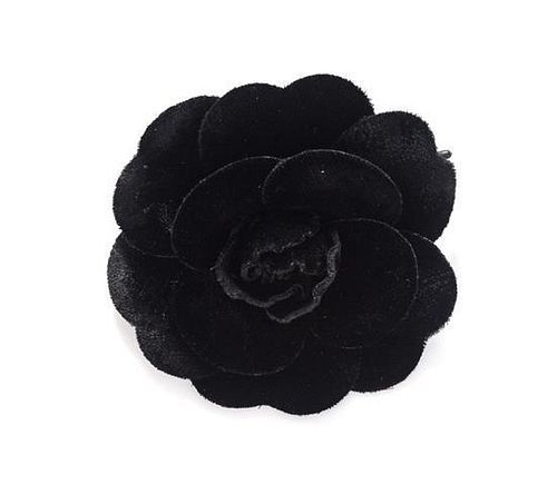A Chanel Medium Black Velvet Camellia Brooch.