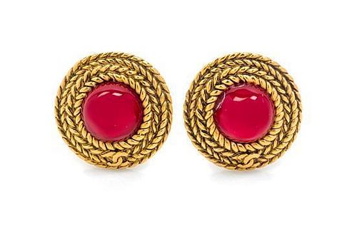 A Pair of Chanel Goldtone and Red Gripoix Glass Earclips,