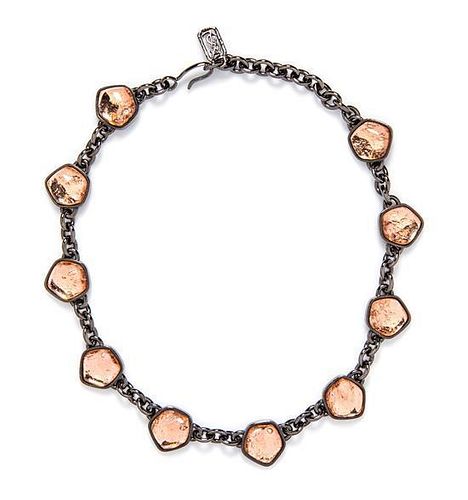 An Yves Saint Laurent Pink Glass and Gunmetal Necklace.