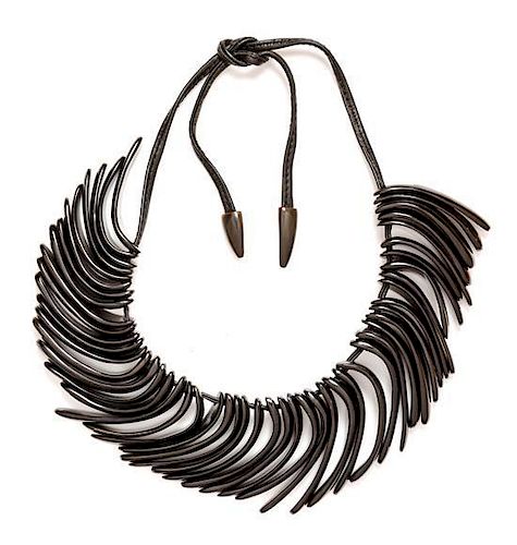 * A Black Resin Necklace.