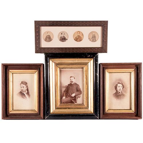 Four framed 19th century portrait photographs.