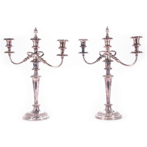 A pair of early 19th century silver plate Sheffield candelabras.