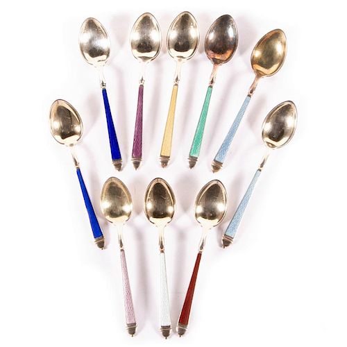 A set of sterling and enamel spoons.