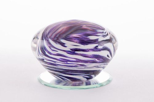 A glass paperweight.