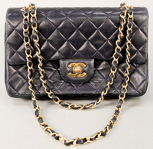 Chanel quilted navy lambskin leather double flap small bag or purse with original dust bag.  ht. 5 1/2 in., approximate wd. 9 1/4...