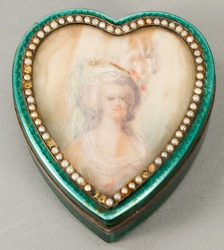 Silver heart shaped box, enameled in green with heart shaped portrait, surrounded by small pearls (6 missing).  ht. 1 1/4 in., top...
