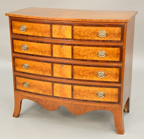 Federal bow front, four drawer chest, twelve panels, flame birch, Portsmouth, N.H., circa 1800. 