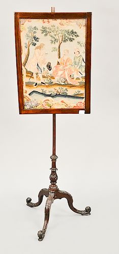 George III mahogany pole screen with needlework and petit point panel on carved tripod base.  ht. 23 1/4 in., wd. 17 in.