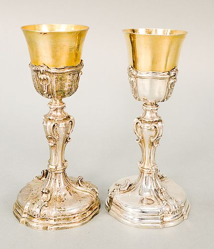 Pair of Continental silver chalice, having gilt decorated cups (one cup base slightly pushed in).  ht. 10 1/8 in. & ht. 10 1/4 in....