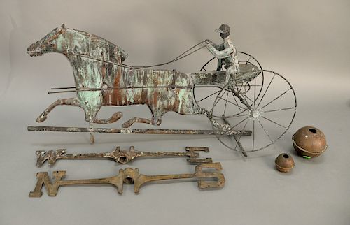 Horse and sulky weathervane with directional (one ear off horse).  weathervane ht. 15 1/2 in., lg. 34 in.