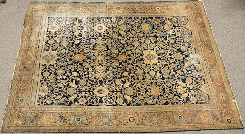 Oushak Oriental carpet (worn, 6 in. tear at border).  9' x 12'6"