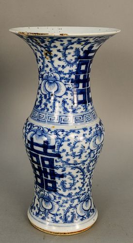 Blue and white beaker vase (gu), China, 19th century, with large central calligraphy against a scrolling floral and foliage backgrou...