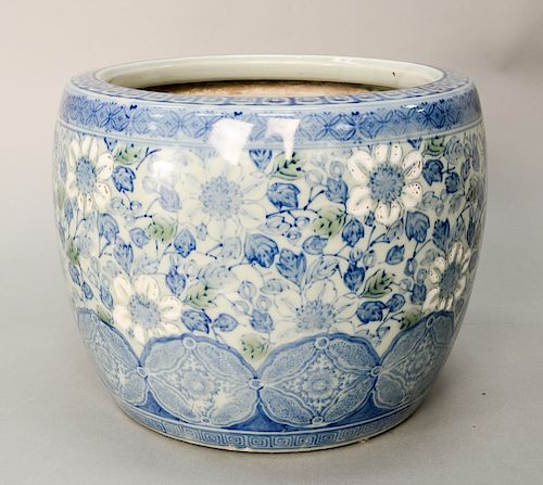 Blue and white porcelain hibachi, Japan, Meiji 19th/20th century, decorated with underglaze blue flowers and raised white enameled f...