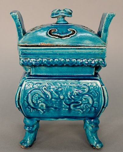 Turquoise ceramic covered censer, China, (possibly Ming), in archaic fang ding form decorated in low relief with chilong dragons and...