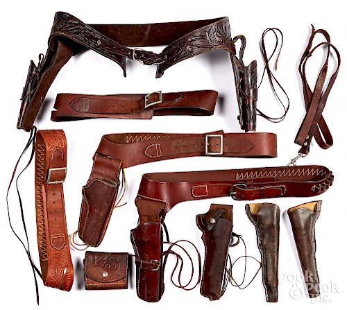 Collection of leather ammo belts and holsters