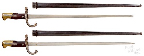Two French Gras St. Etienne bayonets and scabbards