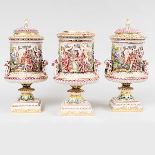 Set of Three Large Capodimonte Porcelain Urns and Two Covers