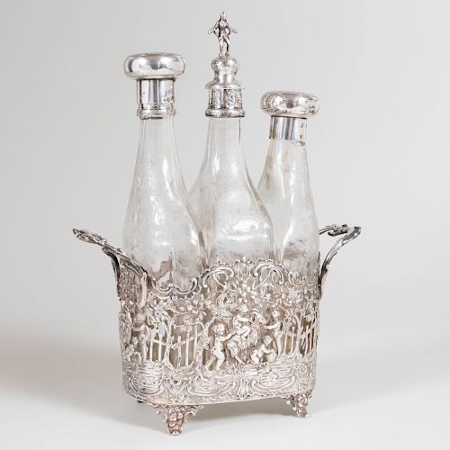 Continental Silver Cruet Frame Fitted with Three Etched Glass Bottles